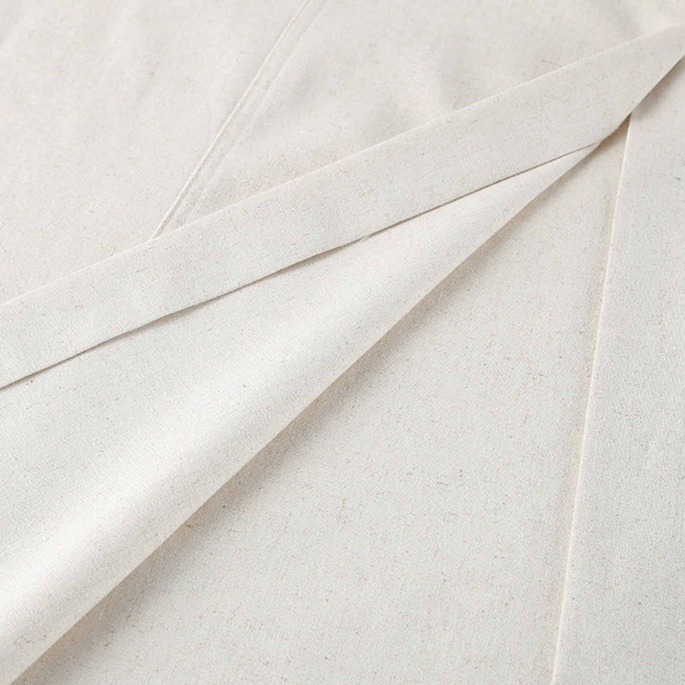 Close-up of a white fabric with folds