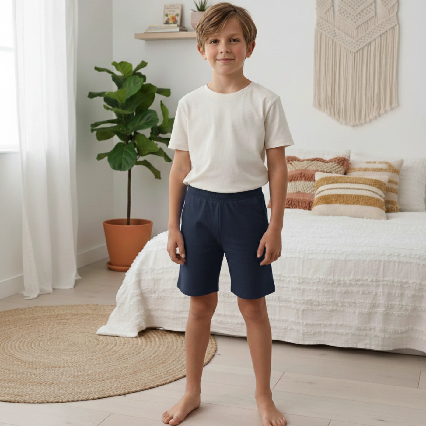 Child playing outdoors wearing Kids Elastic Waist Cotton Shorts in a relaxed, casual style.