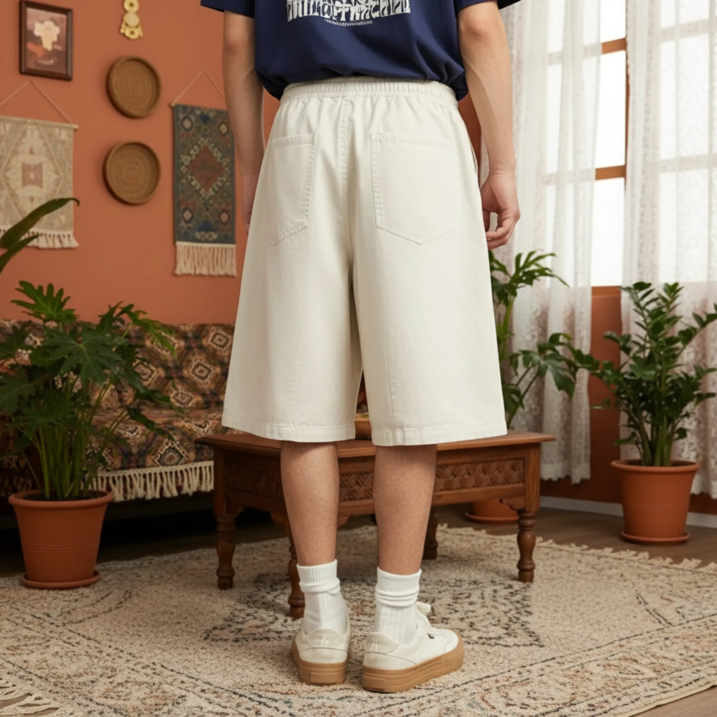 Model wearing PureOnSkin Men's Relaxed Fit Cotton Casual Shorts for a classic and skin-friendly casual outfit.