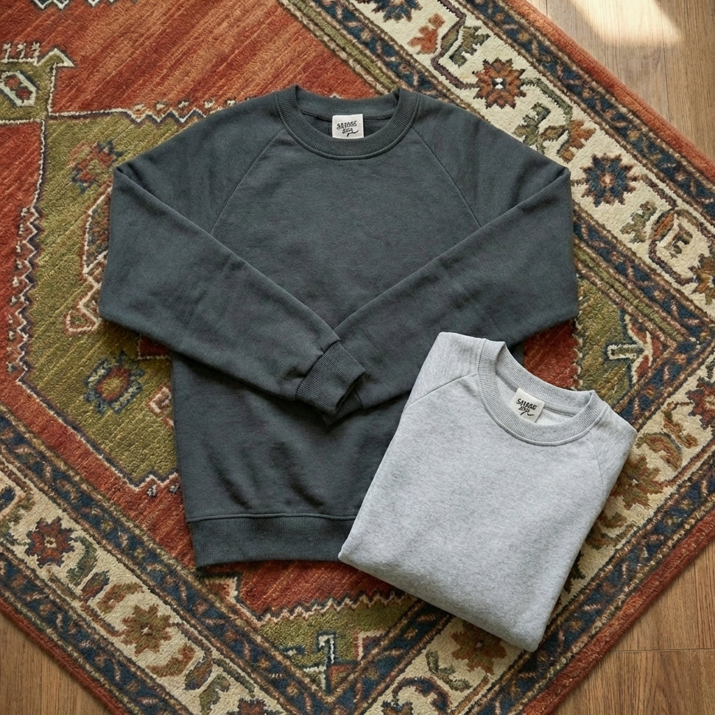 Men’s casual loose-fit sweater in 100% pure cotton, featuring a relaxed drop-shoulder design and a mid-weight ribbed knit texture.