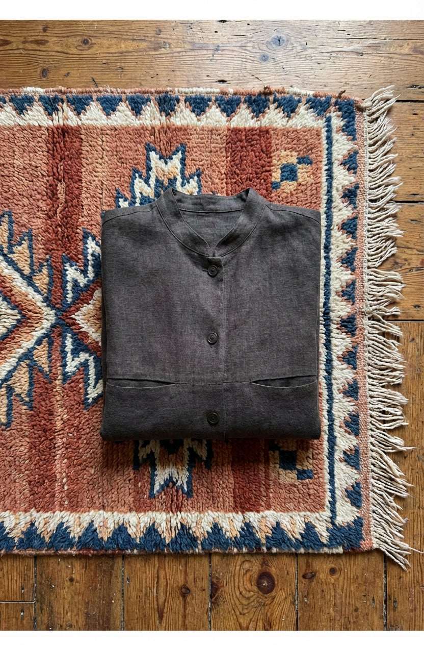 A lightweight women’s cardigan in solid [Insert Color], made from breathable linen fabric with a relaxed open-front design and long sleeves.